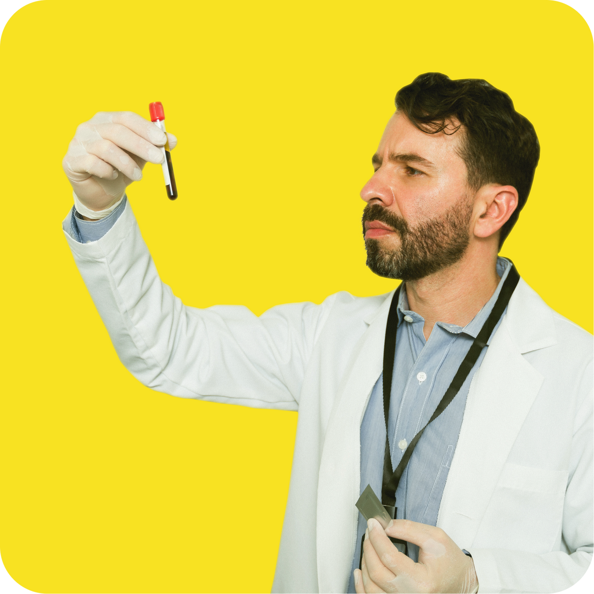 A man in a lab coat inspecting a vial of blood on a yellow background.